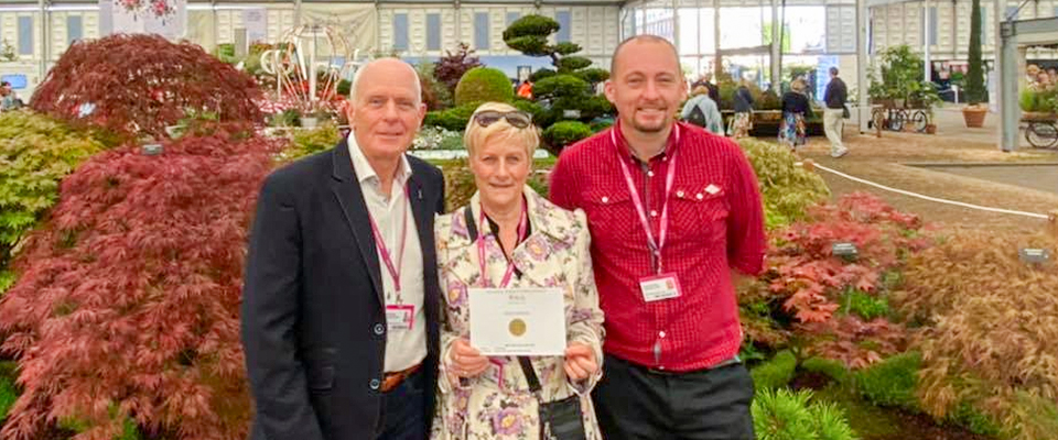 Neil and Catherine Kenney (Larchfield Trees) with David Cheshire (David Cheshire Nurseries) win gold at RHS Chelsea Flower Show.